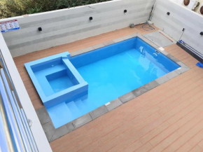 2 bedrooms appartement at Trou aux Biches 900 m away from the beach with shared pool terrace and wifi